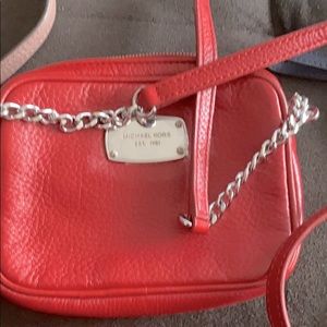 Red Michael Kors good condition.
